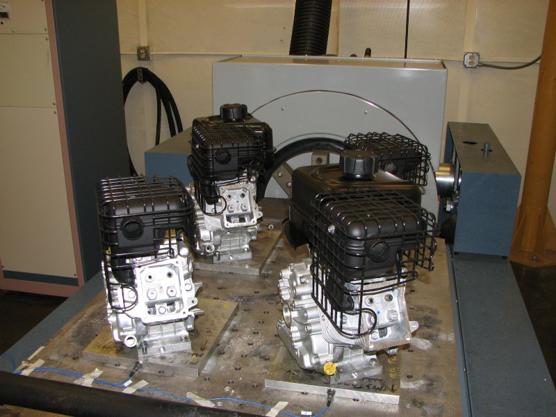 Four small engines are simultaneously tested on a horizontal slip table